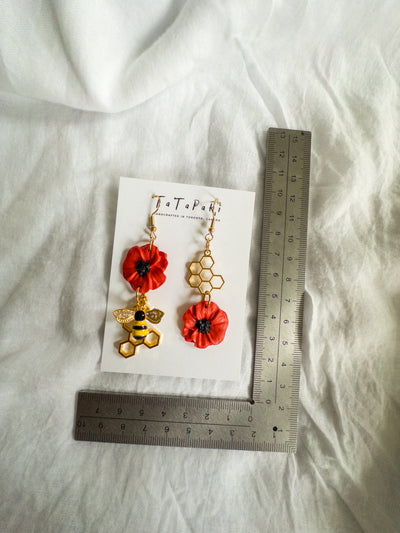 Asymmetrical Poppies and bees